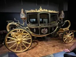 An ornate golden coach.