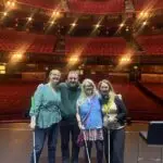 Chris, Suzie, Rachel, and Fiona standing on the stage of the London Palladium just before Chris&rsquo;s amazing show.