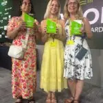 Eye Matter member Amrit, our founder Suzie and Jules from Jules’ Creative Content on stage, smiling brightly holding one of the awards.