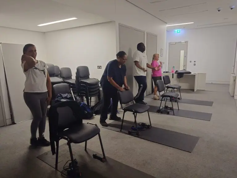 Visually impaired people at the London Aquatics Centre Gym.